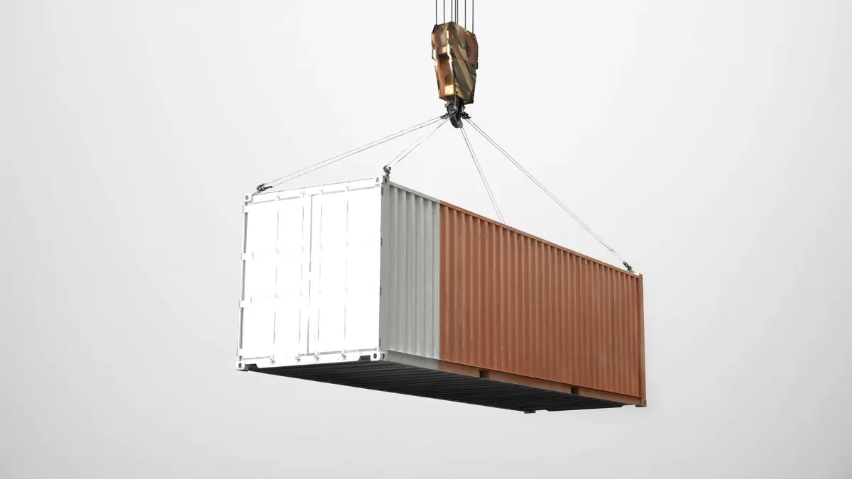 Shipping container on a crane hook